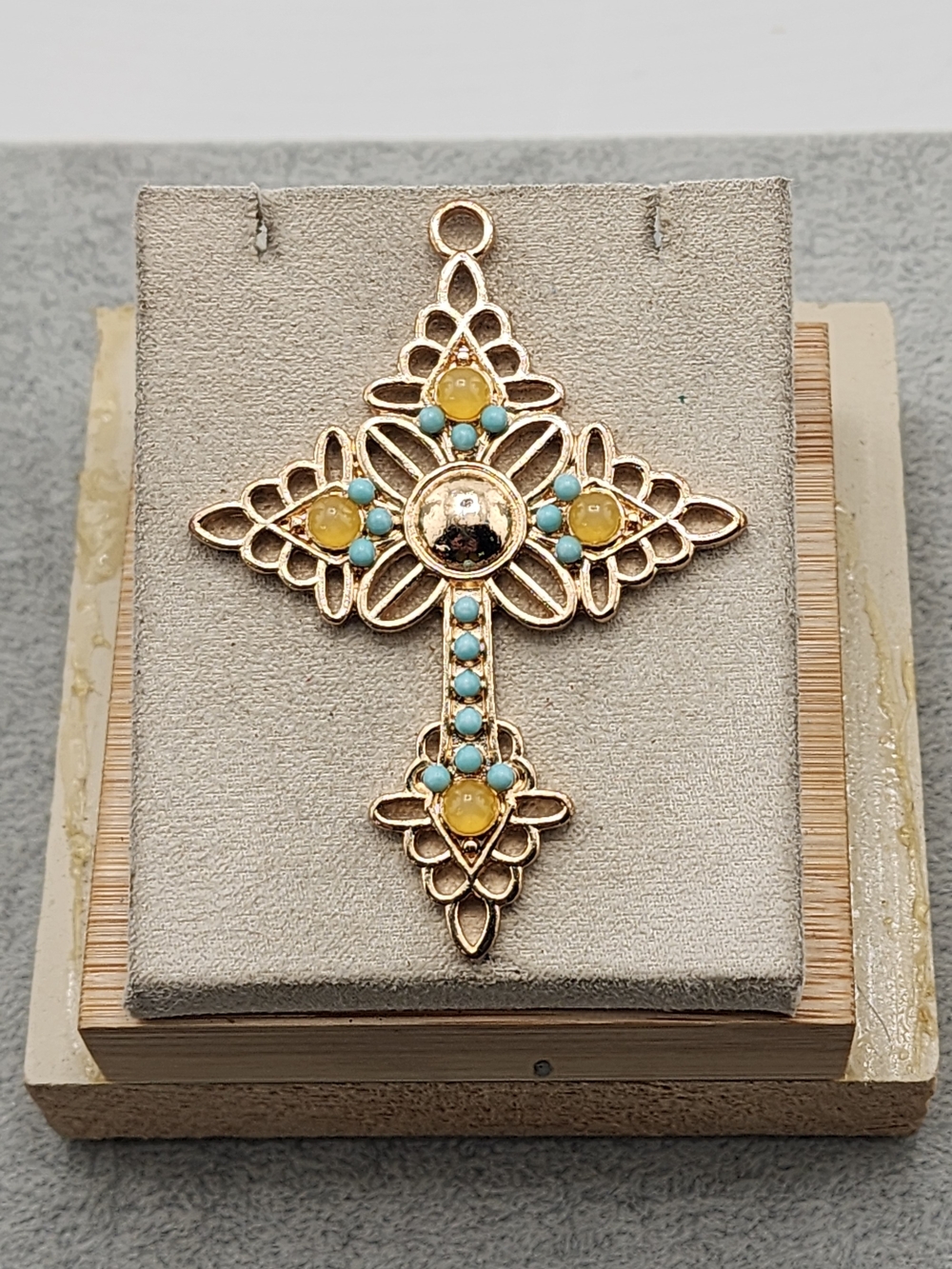 Gold-Tone Cross Pendant with Turquoise and Yellow Accents
